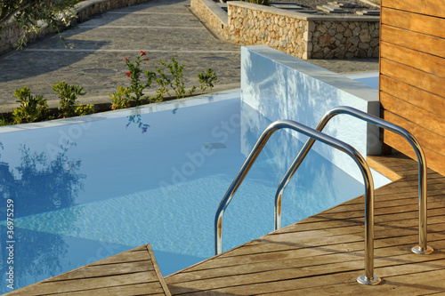 Private swimming pool outside hotel room photo