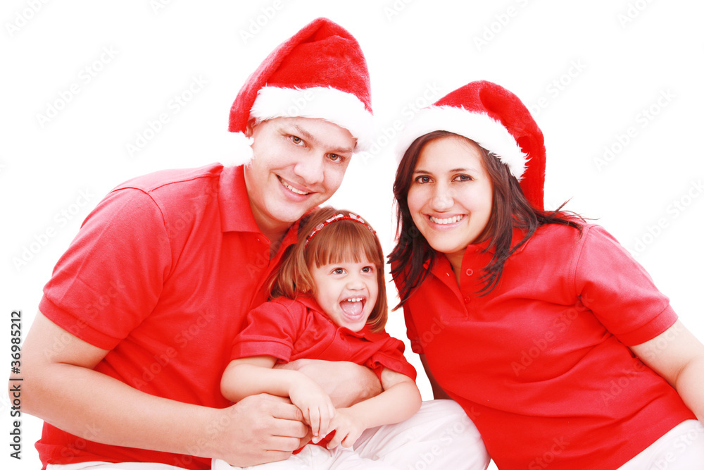 Happiness family in christmas hat isolated on white Happiness family in christmas hat isolated on white