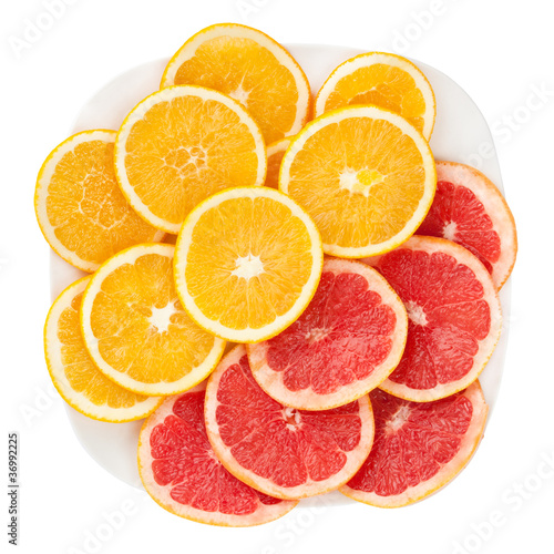 grapefruit and orange on plate