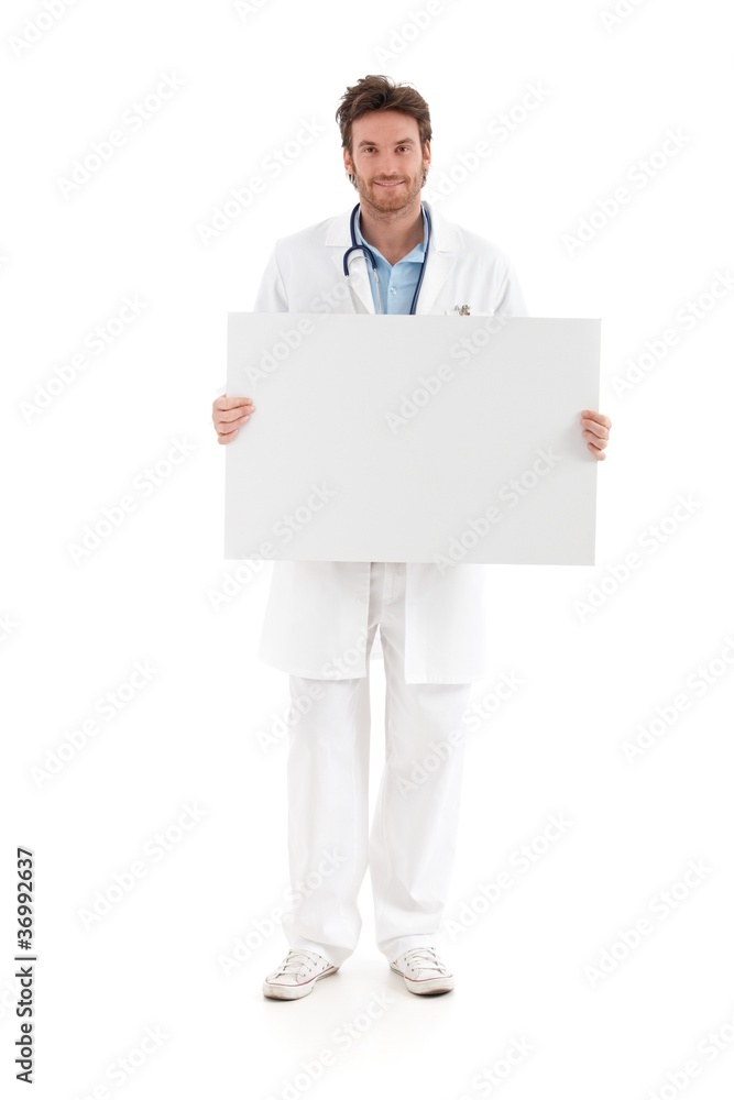 Casual doctor holding blank sheet smiling