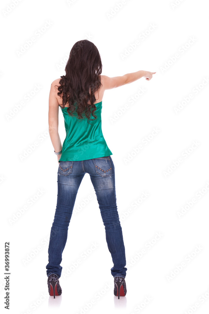 young casual woman points finger young casual woman points finger