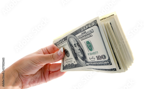 american hundred dollars bundle in the hand isolated on white ba
