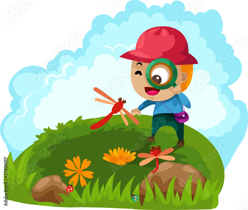 boy looking through a magnifying glass