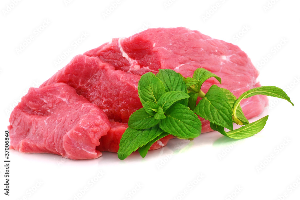 Cut of beef steak with green leaf. Isolated. Cut of beef steak with green leaf. Isolated.
