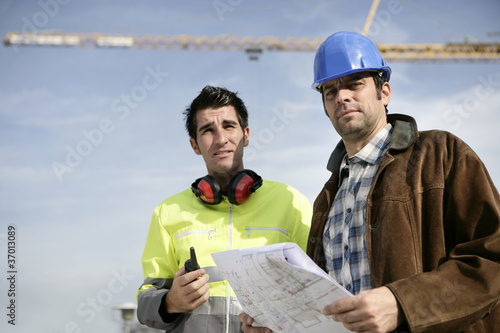 A surveyor and a traffic warden
