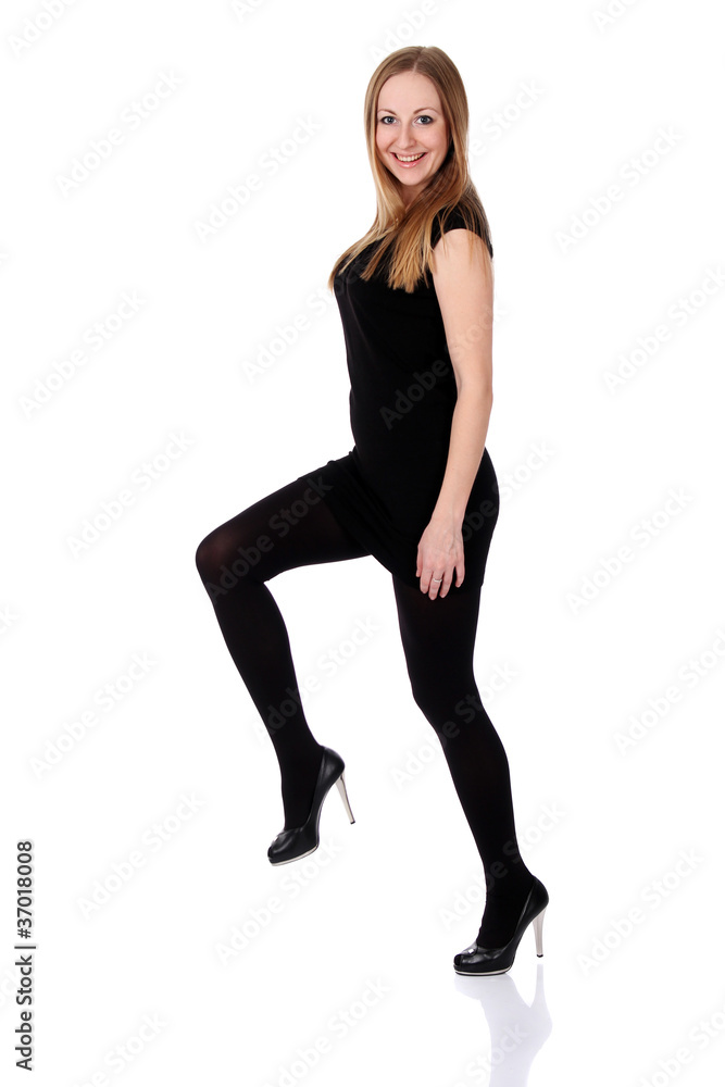 young woman in black dress. Isolated over white background. young woman in black dress. Isolated over white background.