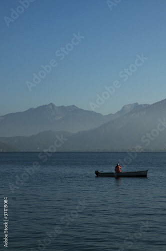 Fisherman on its boat