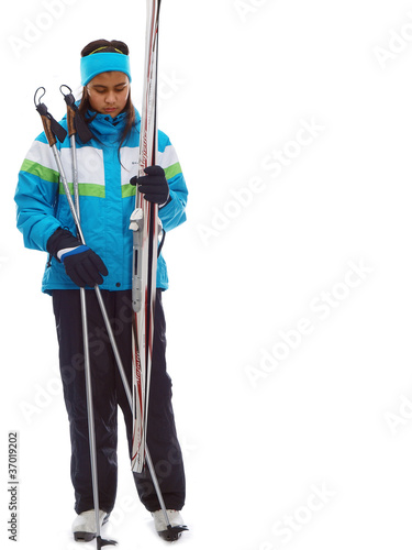 kids carrying skis