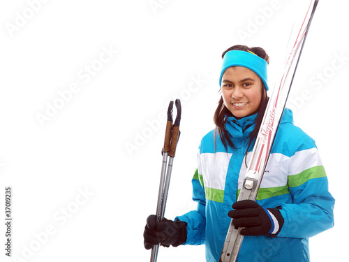 kids carrying skis