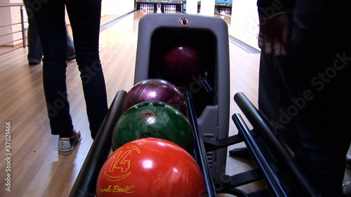 mechanism rolls a bowling ball