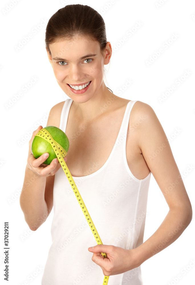 Cheerful girl with apple and tape Cheerful girl with apple and tape