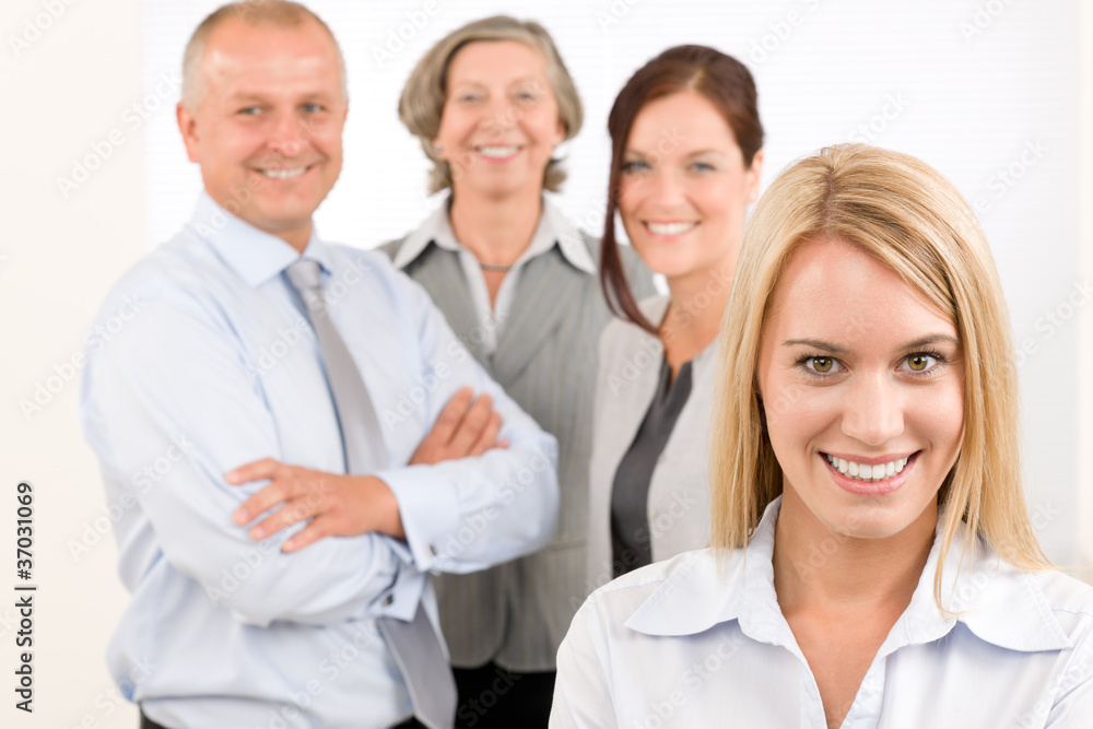 Business team young woman with mature colleagues Business team young woman with mature colleagues