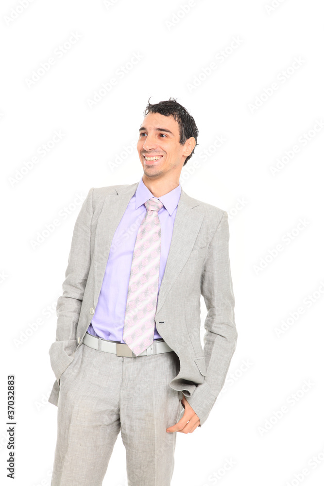 young business man standing with hands in pocket young business man standing with hands in pocket