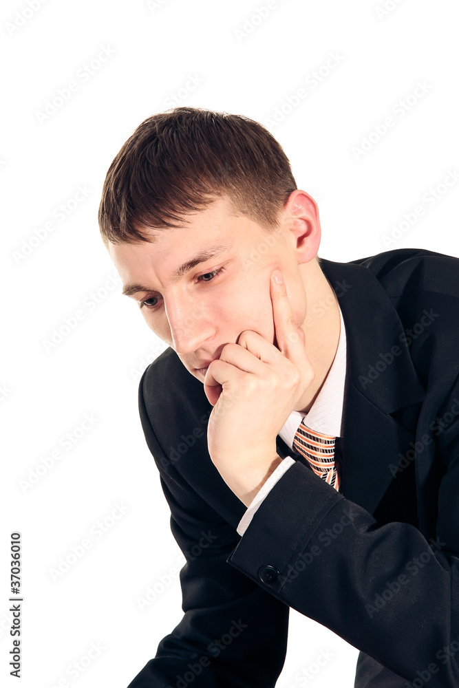 young man in a suit thinking, isolated on white young man in a suit thinking, isolated on white