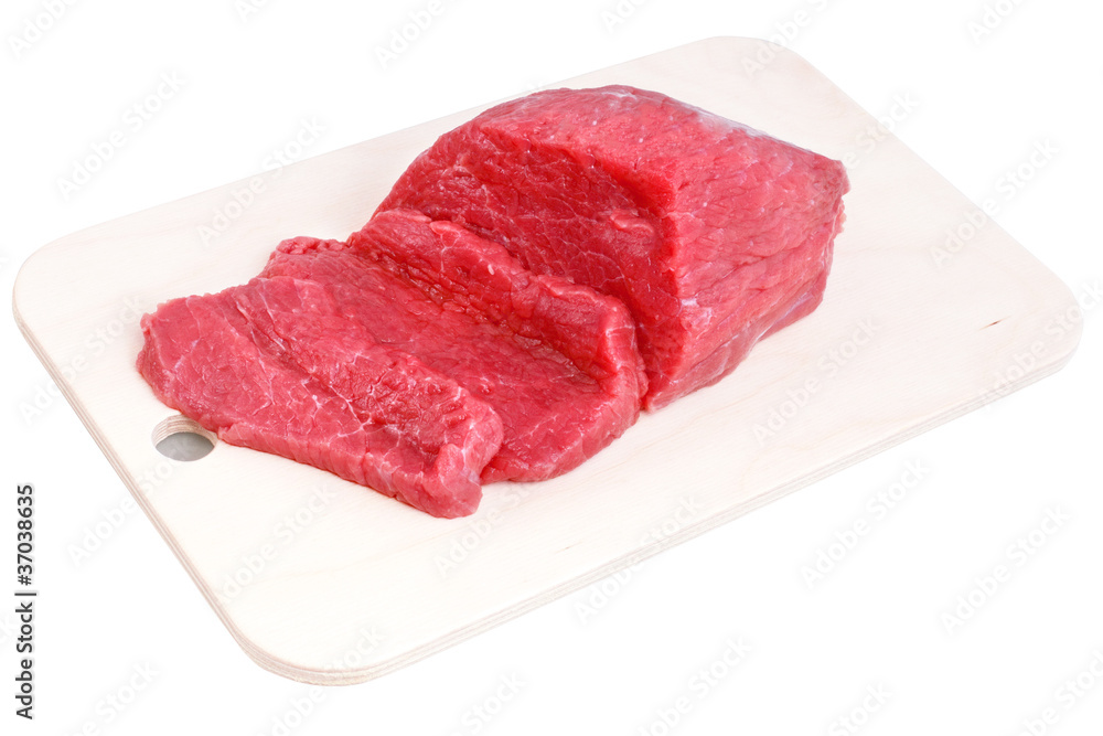 Cut of  beef steak  on meat hardboard. Isolated.