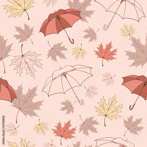 Seamless background pattern of autumn leaves and umbrellas.