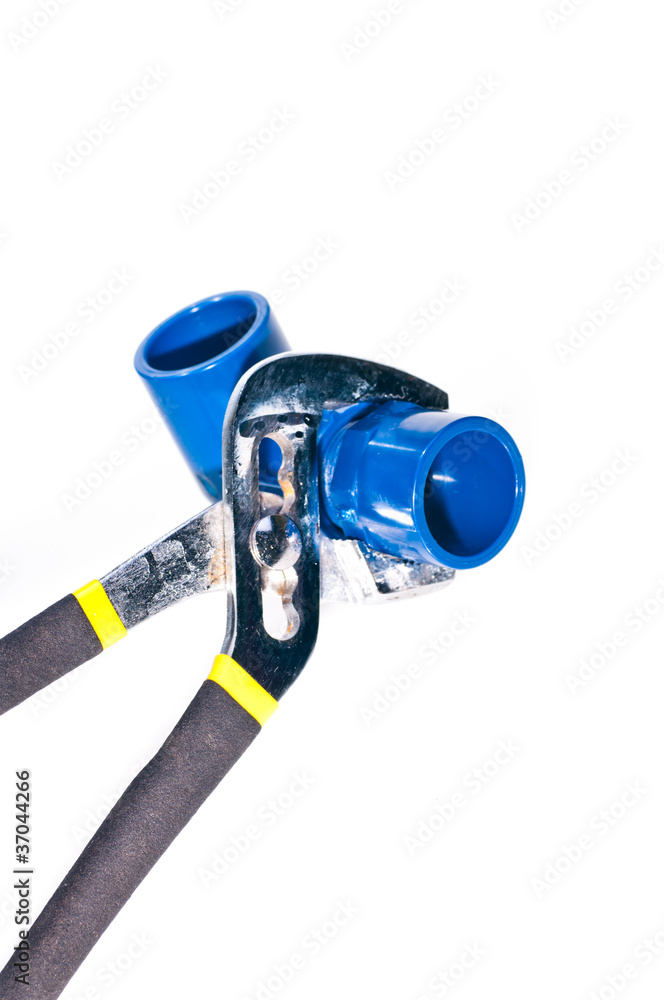 Adjustable wrench holding a pipe fixture Adjustable wrench holding a pipe fixture