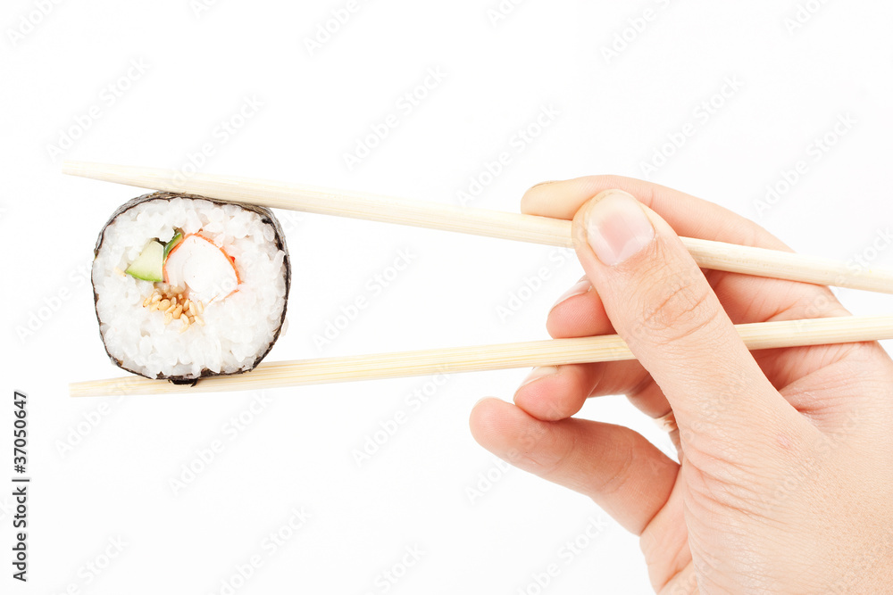 Sushi in a hand Sushi in a hand