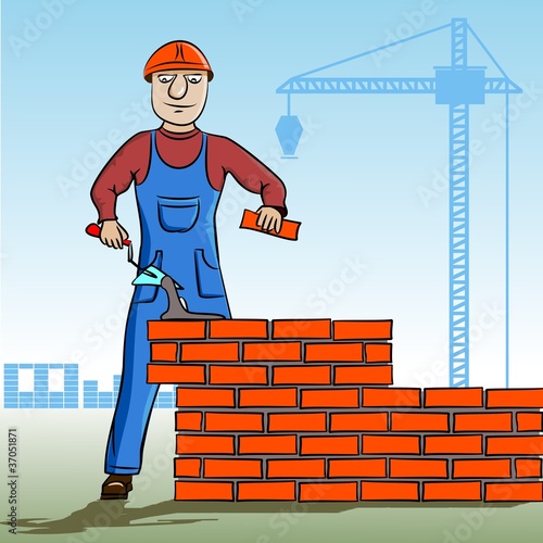 Working mason makes laying bricks.