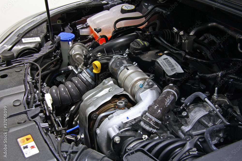 Open car hood with visible engine and interior Open car hood with visible engine and interior