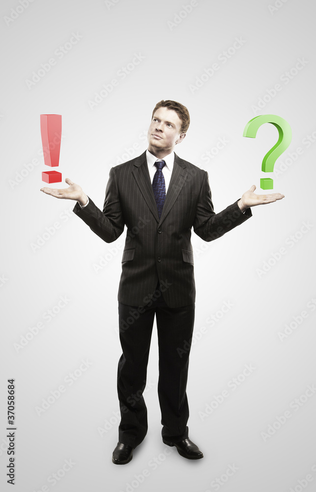 Businessman with a question and exclamation mark Businessman with a question and exclamation mark