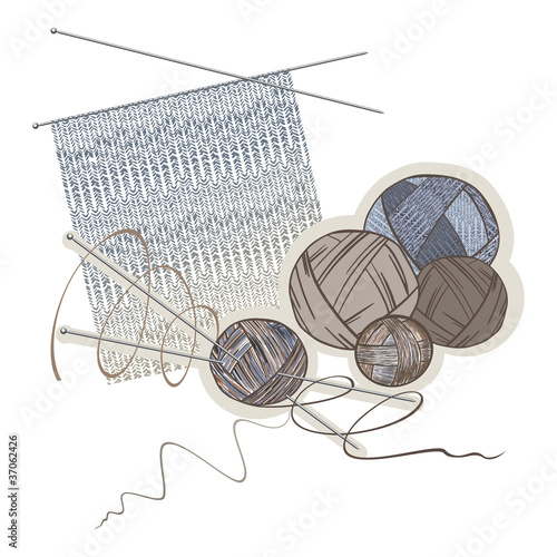 Needles, balls of wool and knitting pattern