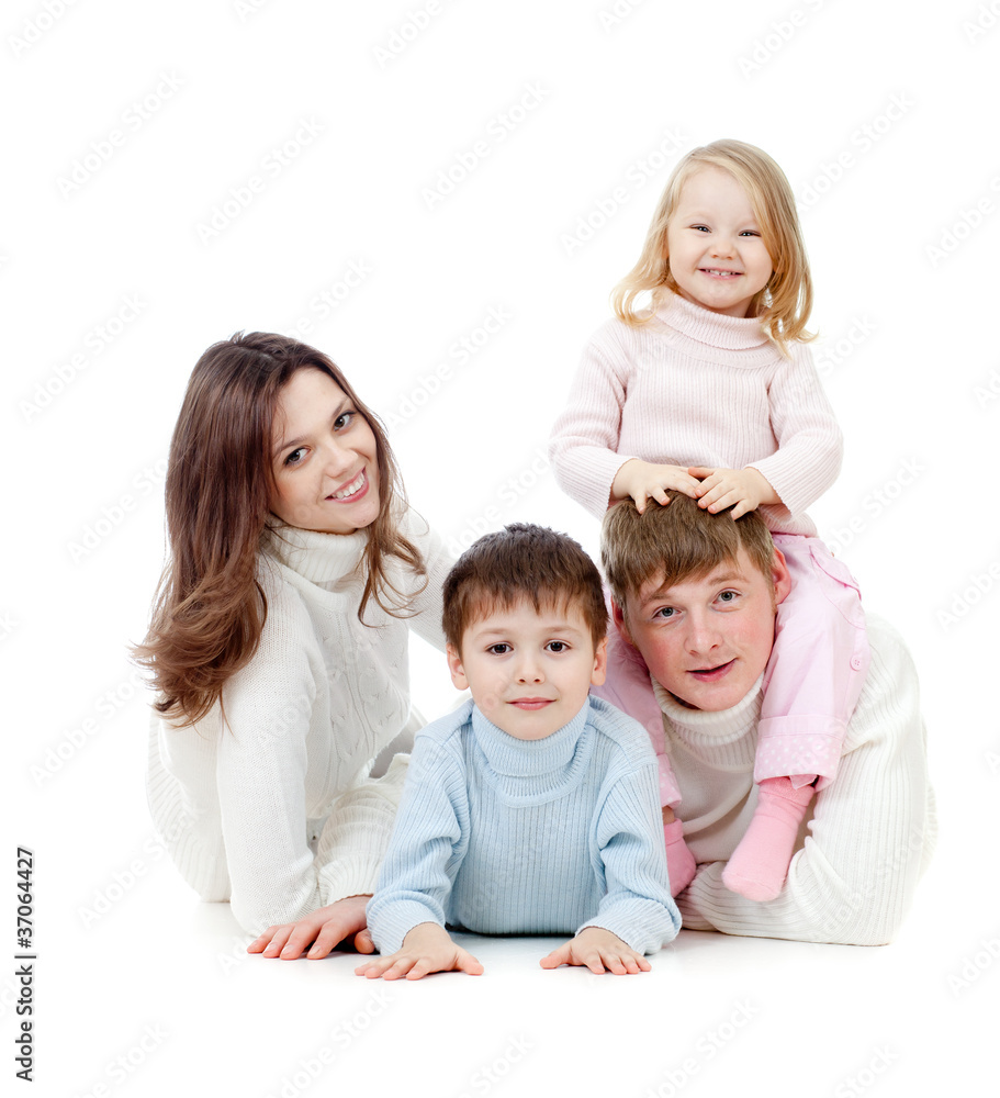 happy family lying on floor in studio isolated on white happy family lying on floor in studio isolated on white