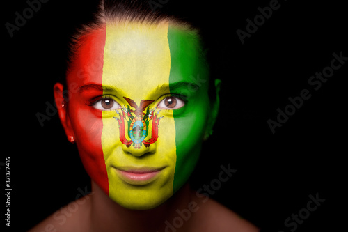 Portrait of a woman with the flag of the Bolivia