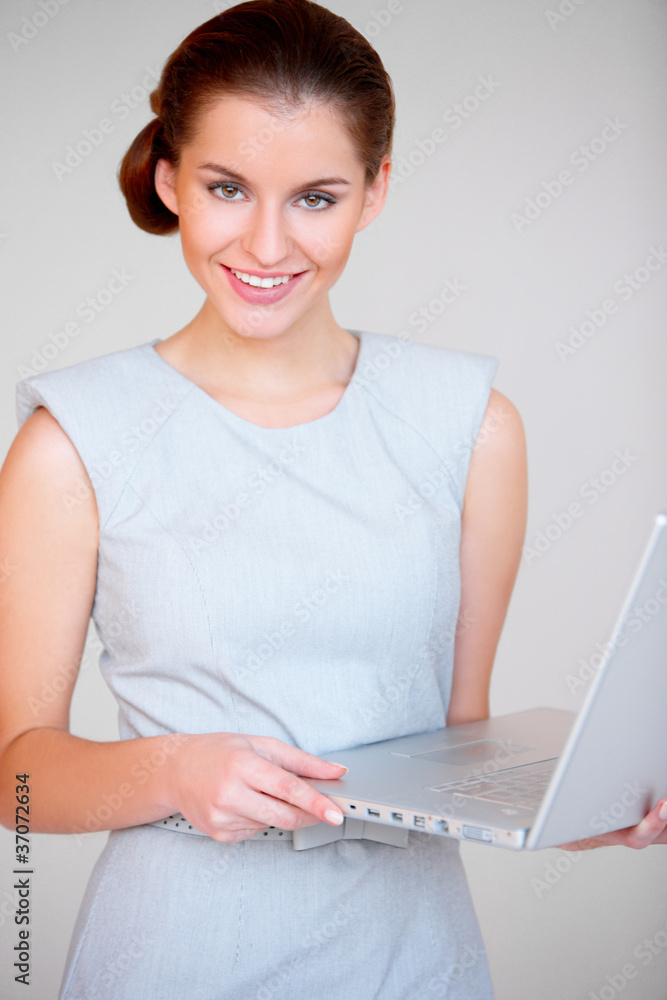 Young attractive business woman with laptop computer Young attractive business woman with laptop computer