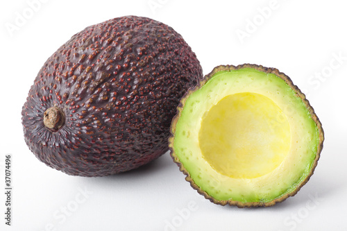 Schwarze Hass-Avocado ( ganz und geteilt ) photo