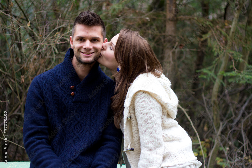 Fototapeta premium Young couple holding hands
