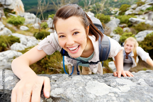 carefree outdoor climbing woman