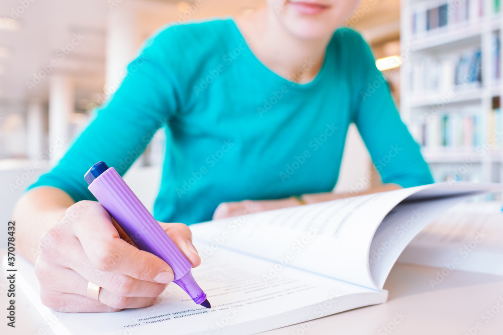 female college student in a library female college student in a library