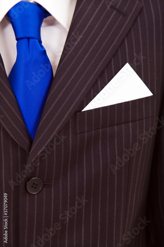 Detail of a Business card in suit's pocket