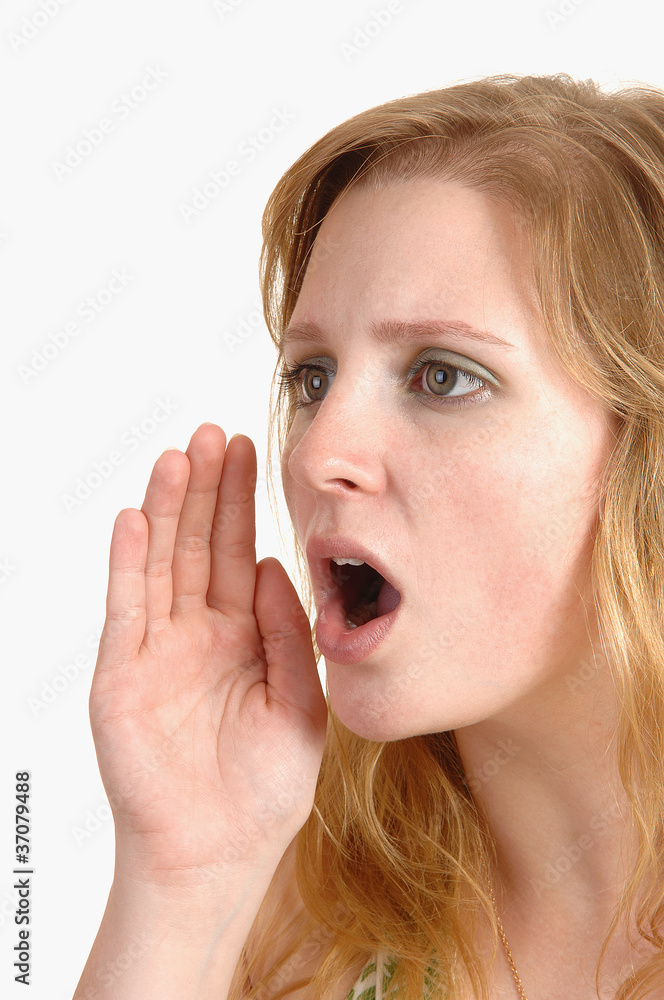 A young blond woman shouting. A young blond woman shouting.
