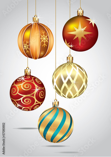 Christmas Ornaments Hanging on Gold Thread