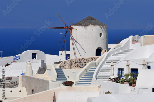 Old Windmill and stairs going in all directions in Santorini