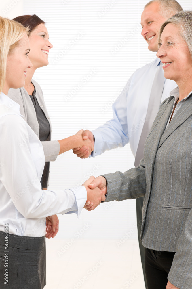 Business partners close deal people shaking hands Business partners close deal people shaking hands