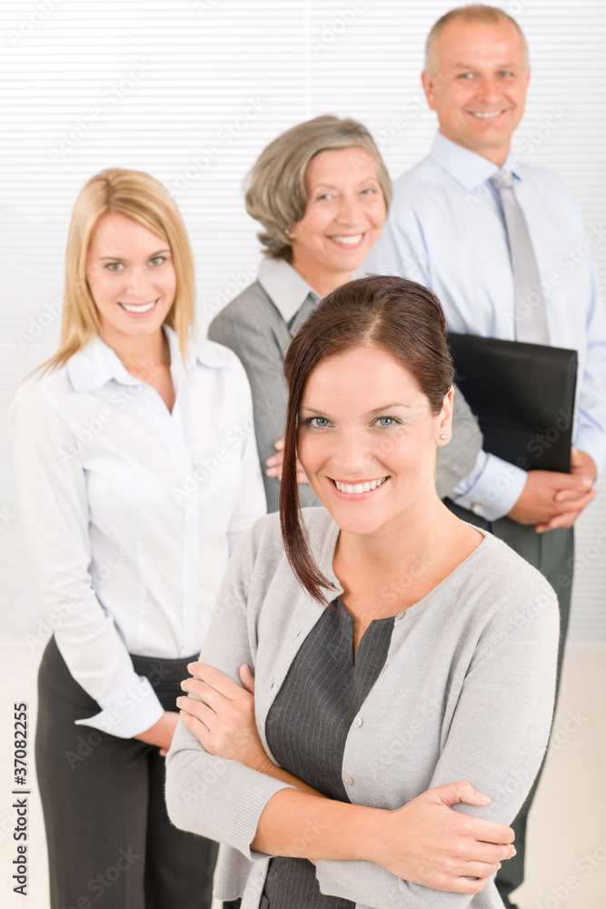 Business team young woman with mature colleagues Business team young woman with mature colleagues