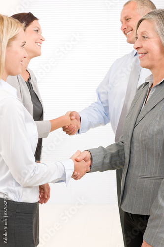 Business partners close deal people shaking hands