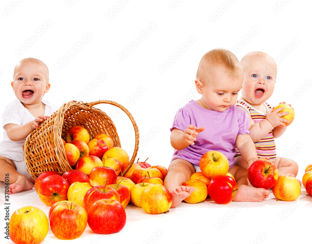 Fototapeta premium babies playing with apples