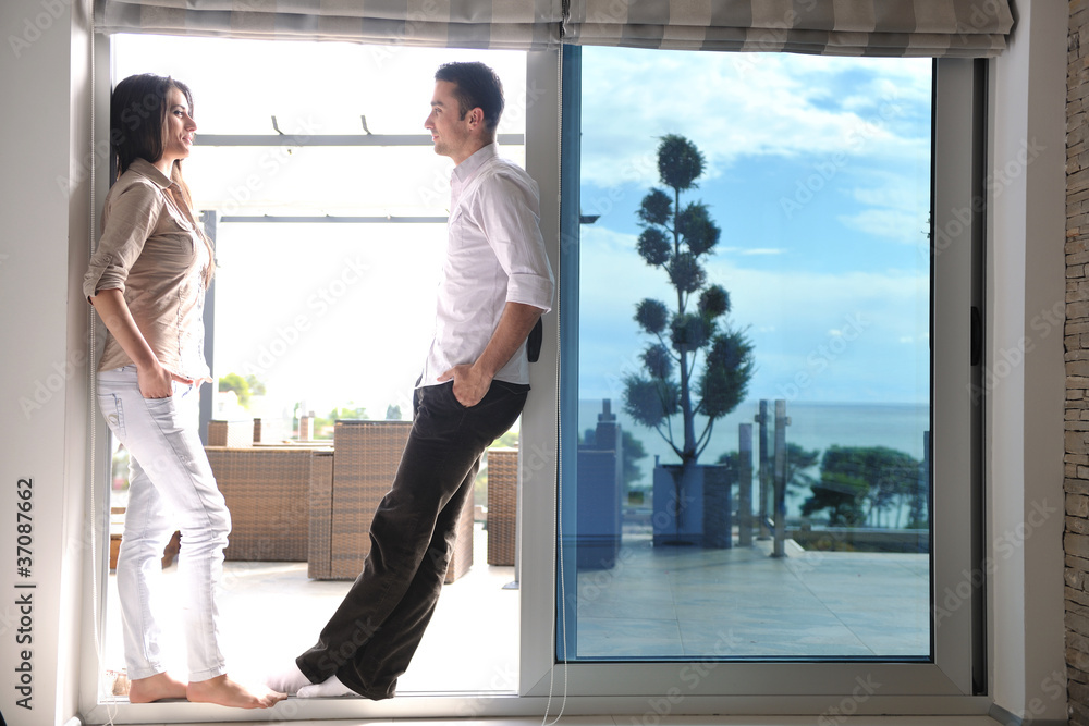 Fototapeta premium happy young couple relax at home