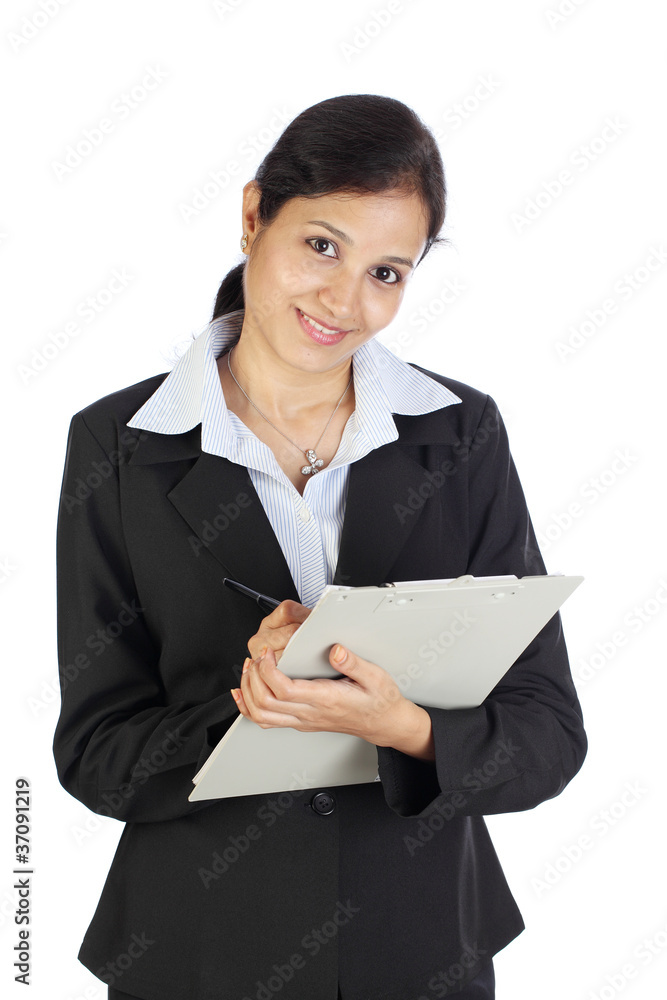 Smiling business woman with clipboard Smiling business woman with clipboard