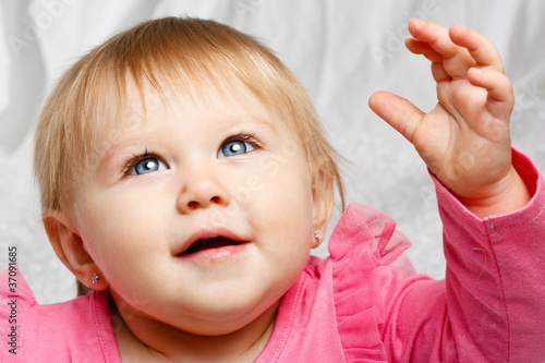 Baby Girl Looking Up at Light