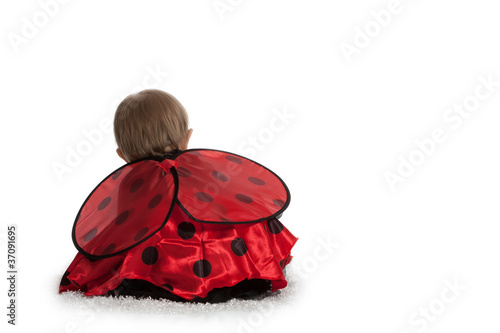 Girl Dressed Up as Lady Bug from Behind