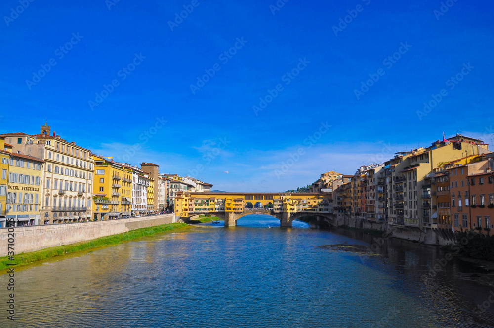 Bringes and houses on Arno river in Florence.