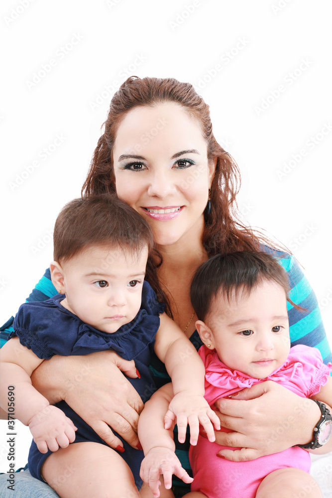 Happy young mother with two babies on a white background. Happy young mother with two babies on a white background.