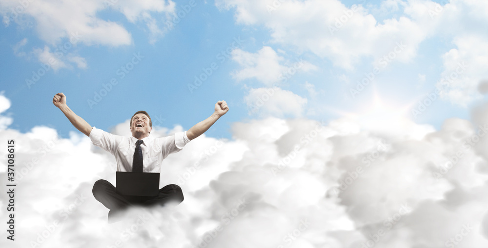 Happy young businessman with laptop sitting on the clouds. Happy young businessman with laptop sitting on the clouds.