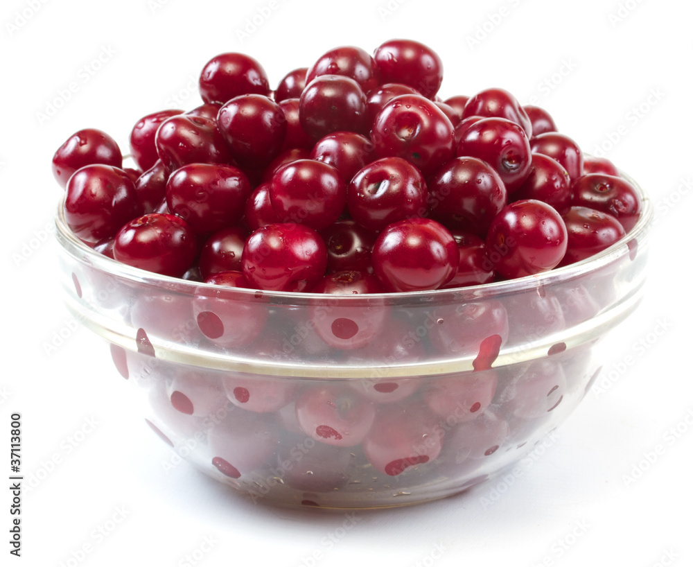 Bowl with ripe cherries. Isolated on a white background. Bowl with ripe cherries. Isolated on a white background.