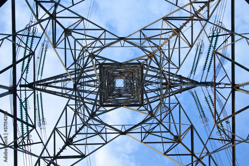 Electrical tower over a blue sky background